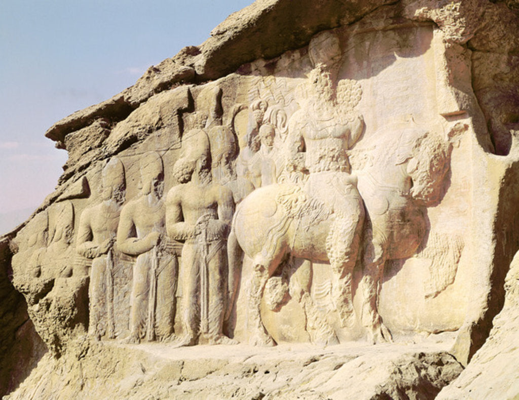 Detail of Rock relief depicting Shapur I and his family wearing heraldic emblems on their hats by Sasanian