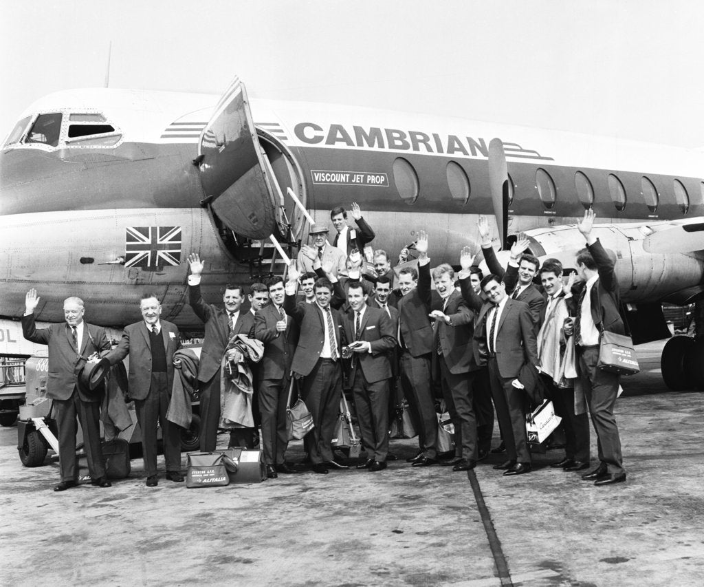 Detail of Everton team members wave before their plane departs from Speke airport by Terry Mealy