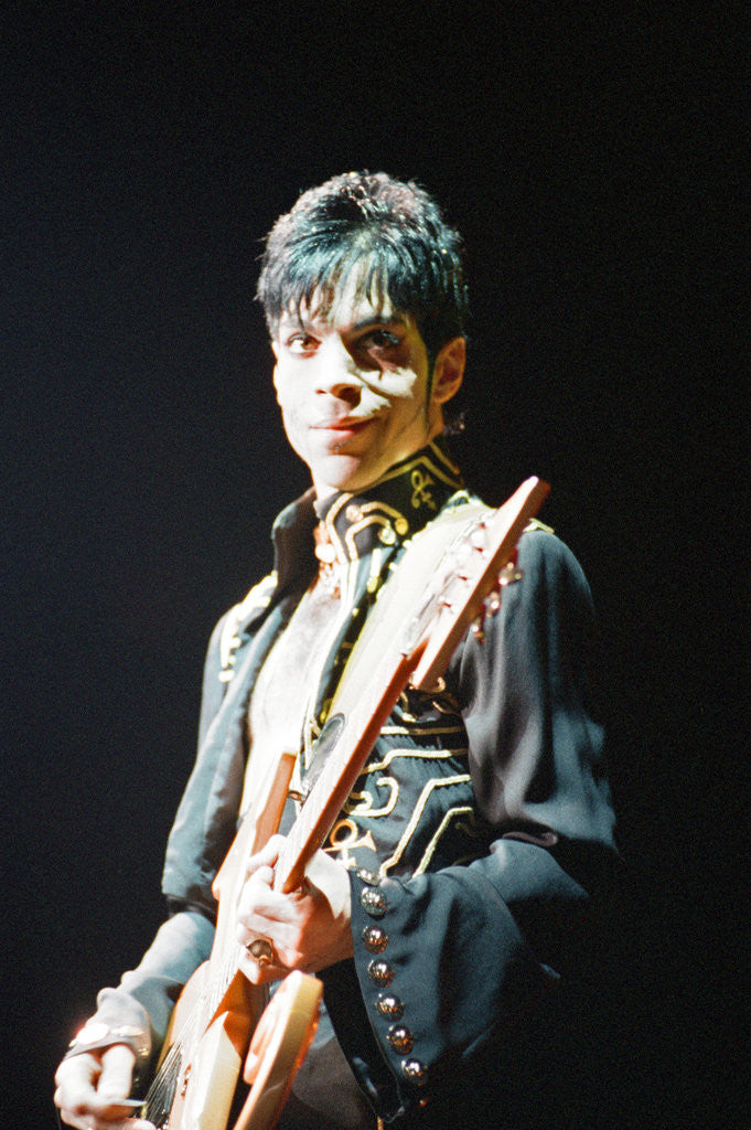 Detail of Prince performing on stage during his 'Ultimate Live Experience Tour' by Richard Nelmes