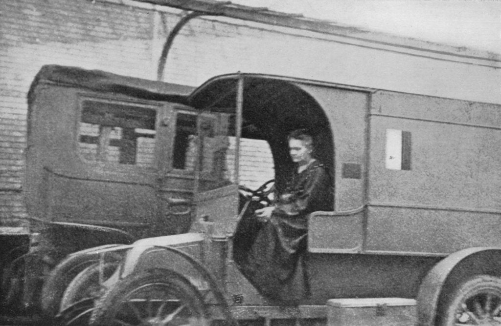 Detail of Marie Curie, Polish-born French physicist, driving a car converted into a radiological unit, 1914 by Unknown