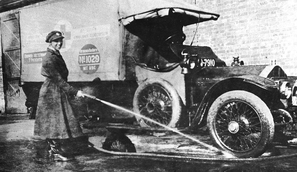 Detail of Volunteer English woman driver washing down her ambulance, Cambridge, World War I, 1915 by Unknown