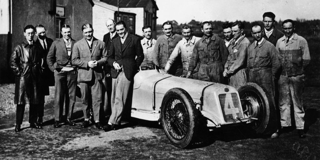 Detail of Robert Benoist with a cigarette, leaning against a Delage 15-S8, 1927 by Unknown