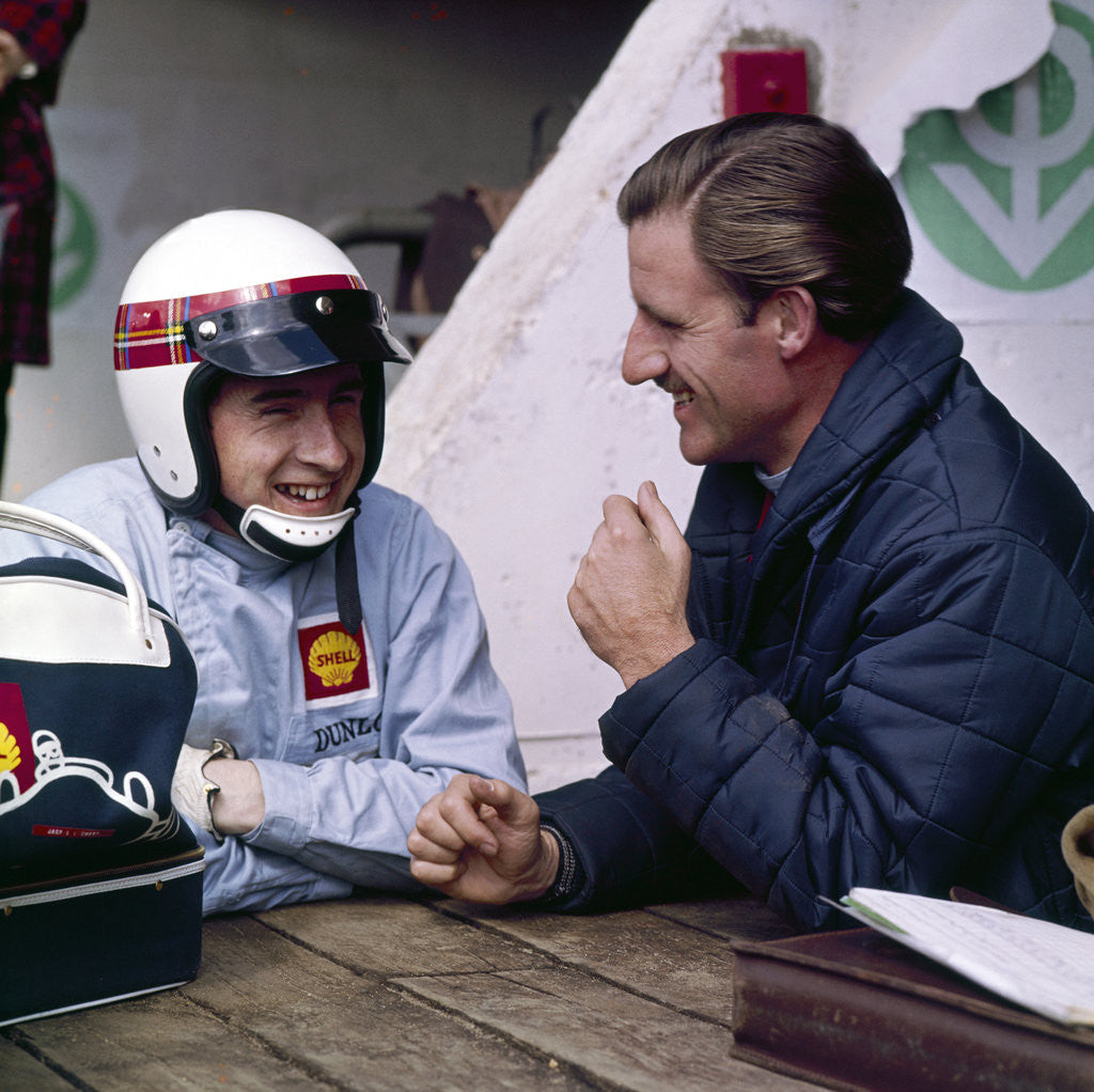 Detail of Jackie Stewart and Graham Hill chatting by Anonymous