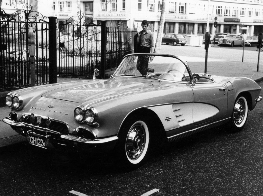 Detail of 1961 Chevrolet Corvette on a parking meter, (c1961?) by Unknown