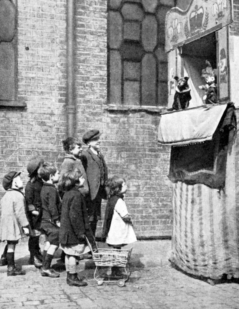 Detail of Children watching a Punch and Judy show in a London street by Donald McLeish