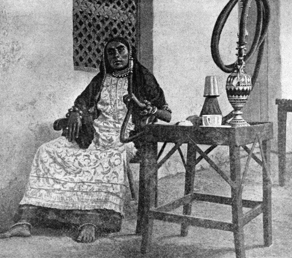 Detail of Somali woman smoking a hookah, Aden by Anonymous