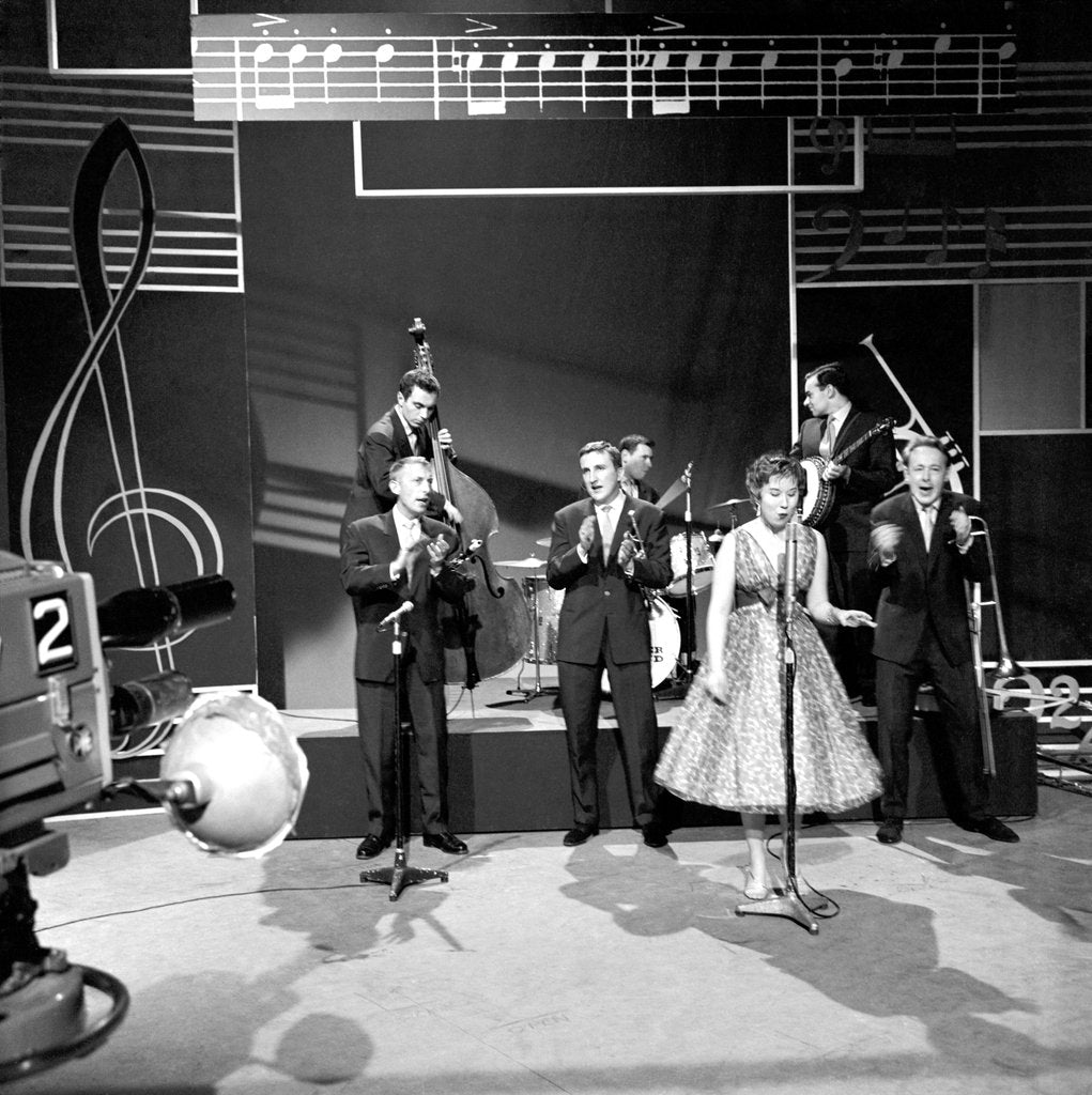 Detail of Chris Barber on stage with Ottillie Patterson and Johnny Duncan by Harry Hammond