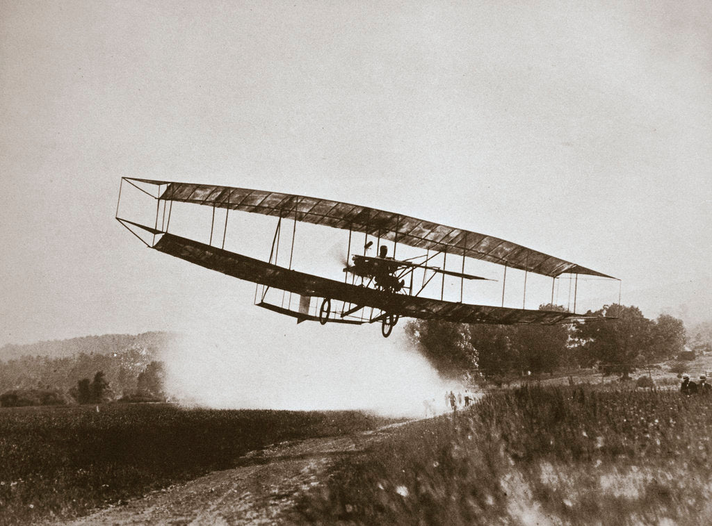 Detail of American aviator Glenn Curtiss making the first heavier-than-air flight in his 'June Bug by Edwin Levick