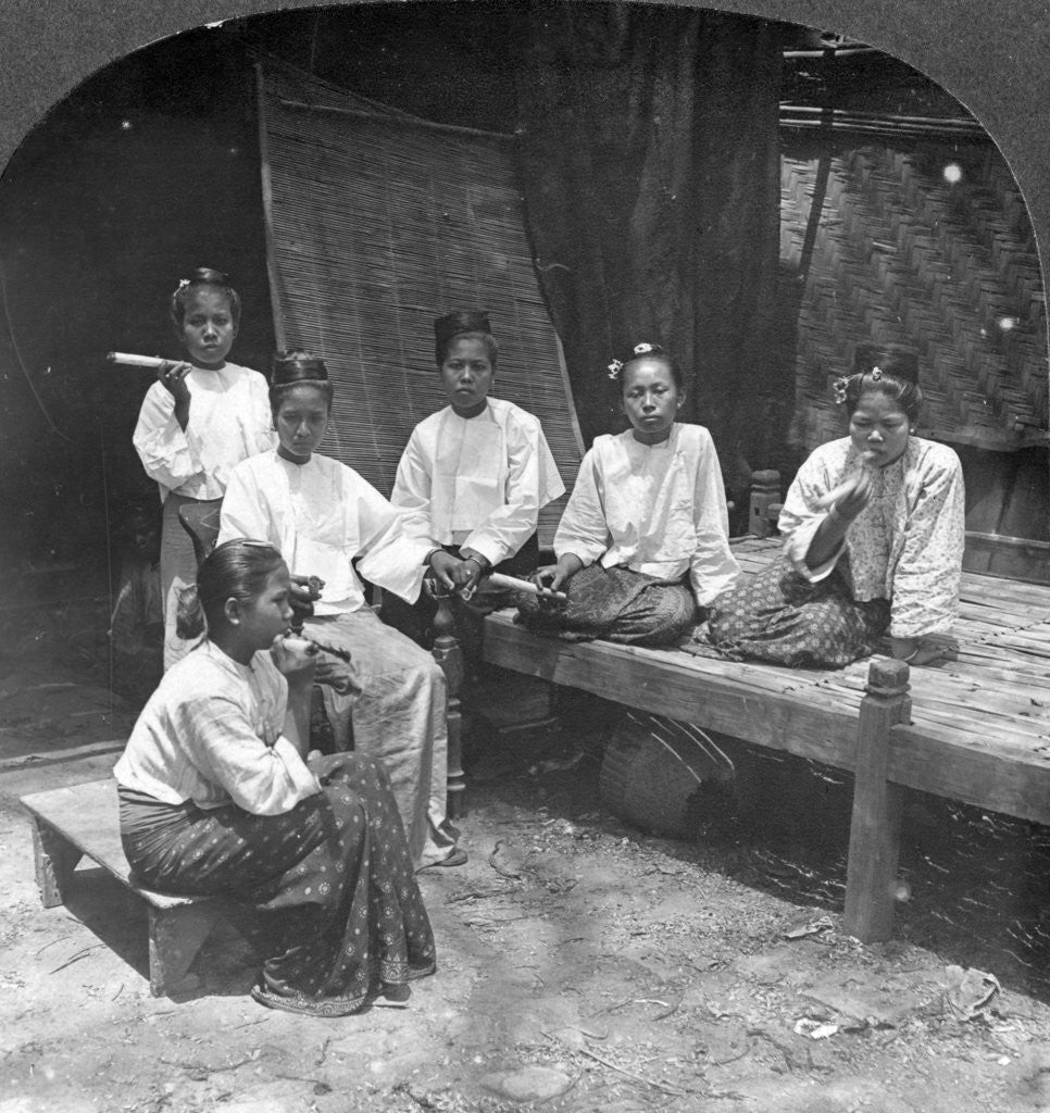 Detail of Burmese women smoking outside their home, Mandalay, Burma by Stereo Travel Co