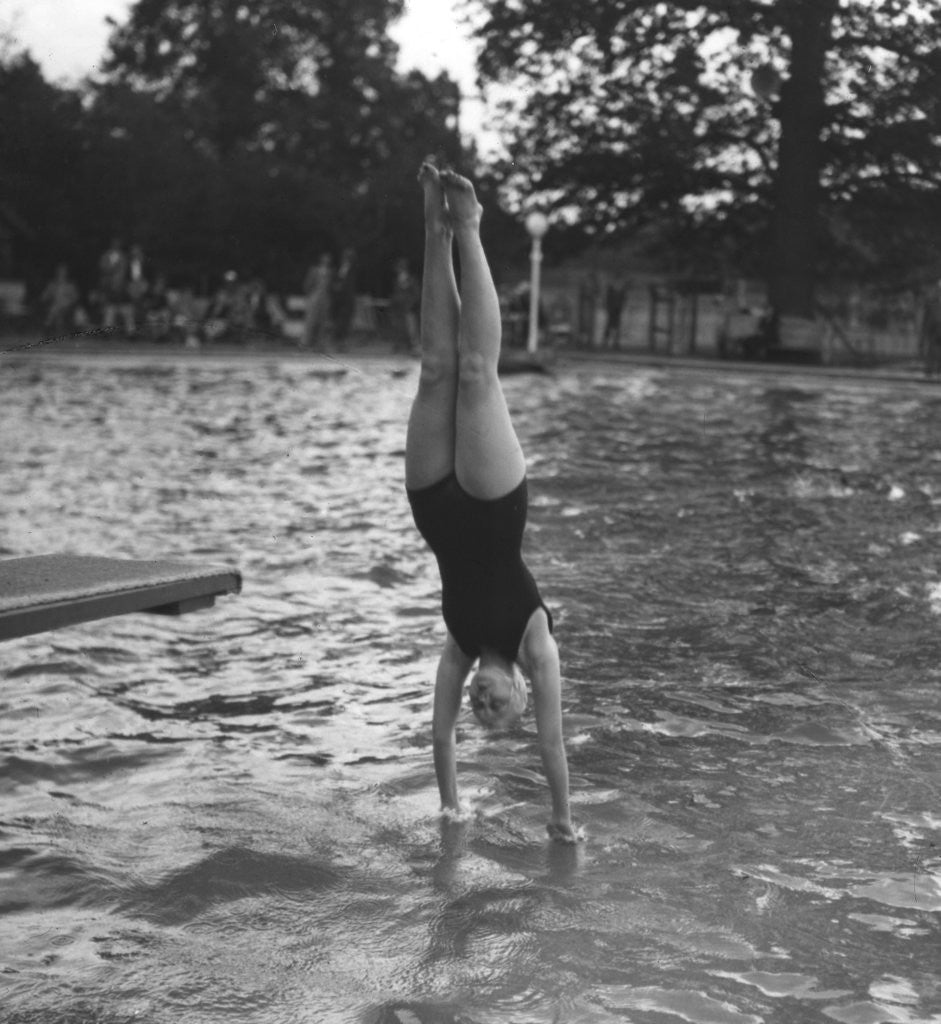 Detail of Woman diving into a swimming pool by Anonymous