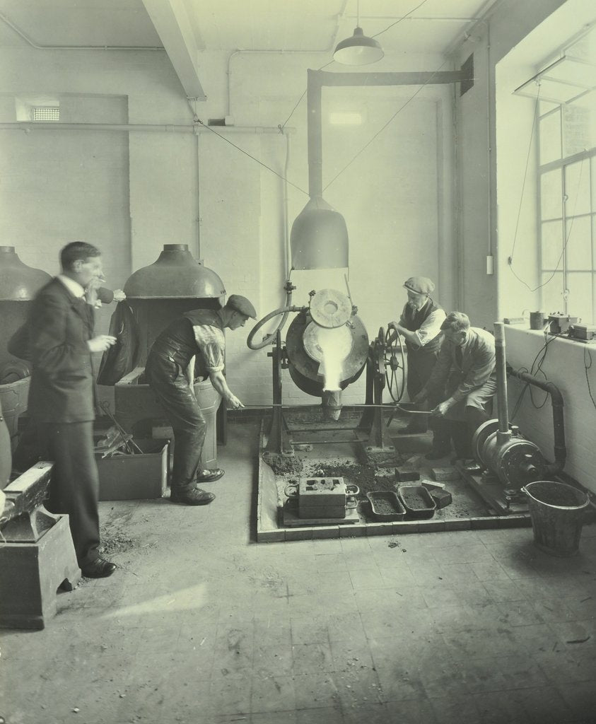 Detail of Men pouring molten metal in a foundry, School of Engineering and Navigation, London, 1931 by Unknown