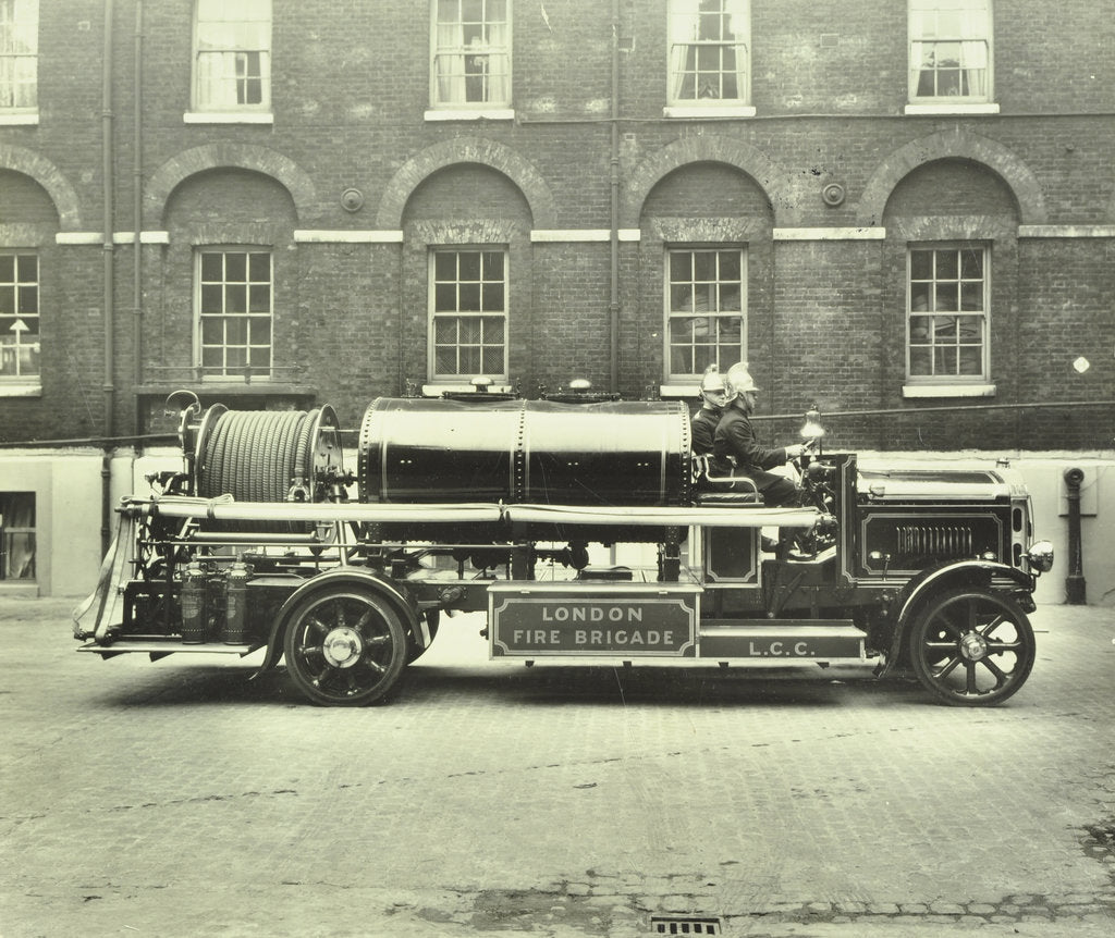 Detail of Firemen aboard a foam tender, London Fire Brigade Headquarters, London, 1929 by Unknown