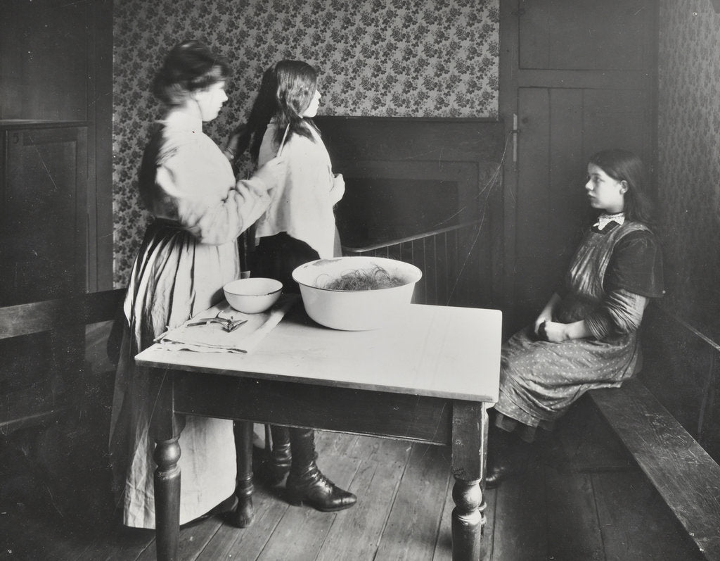 Detail of A nurse examines girls' hair, Central Street Cleansing Station, London, 1914 by Unknown