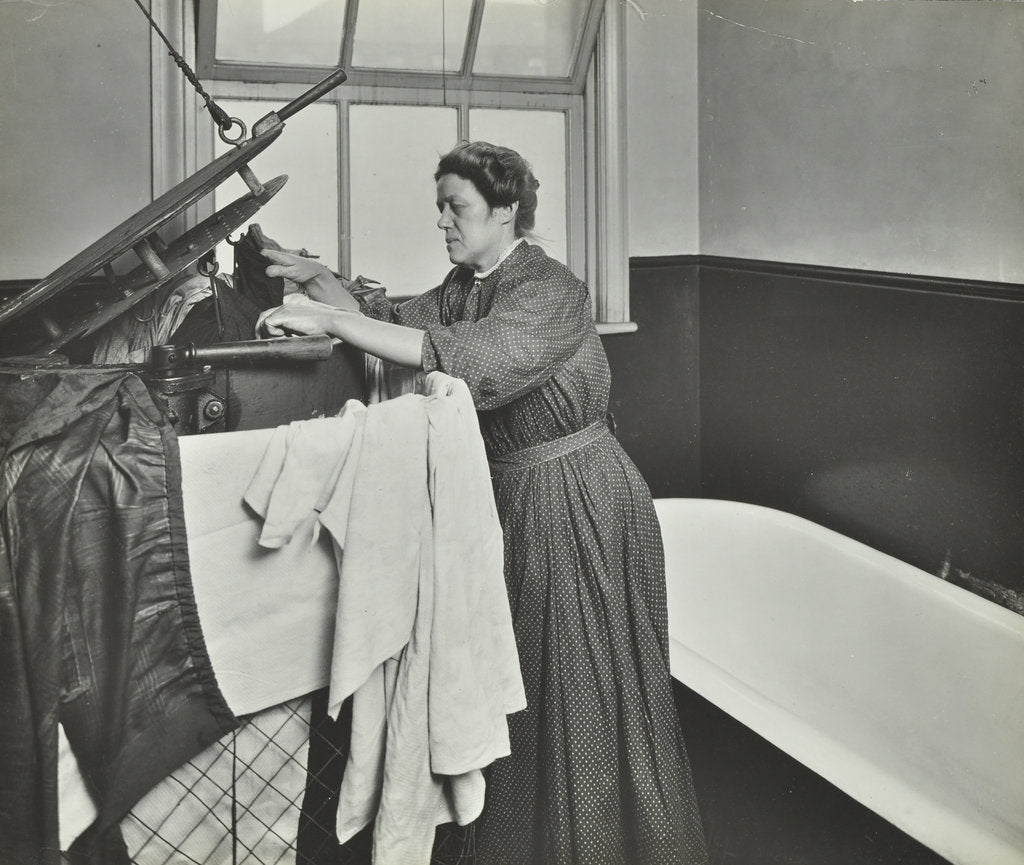 Detail of Nurse using a steriliser in the bathroom at Chaucer Cleansing Station, London, 1911 by Unknown