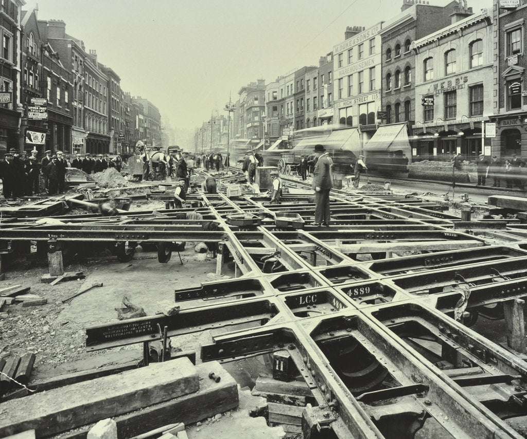 Detail of Men laying tramlines at a junction, Whitechapel High Street, London, 1929 by Unknown