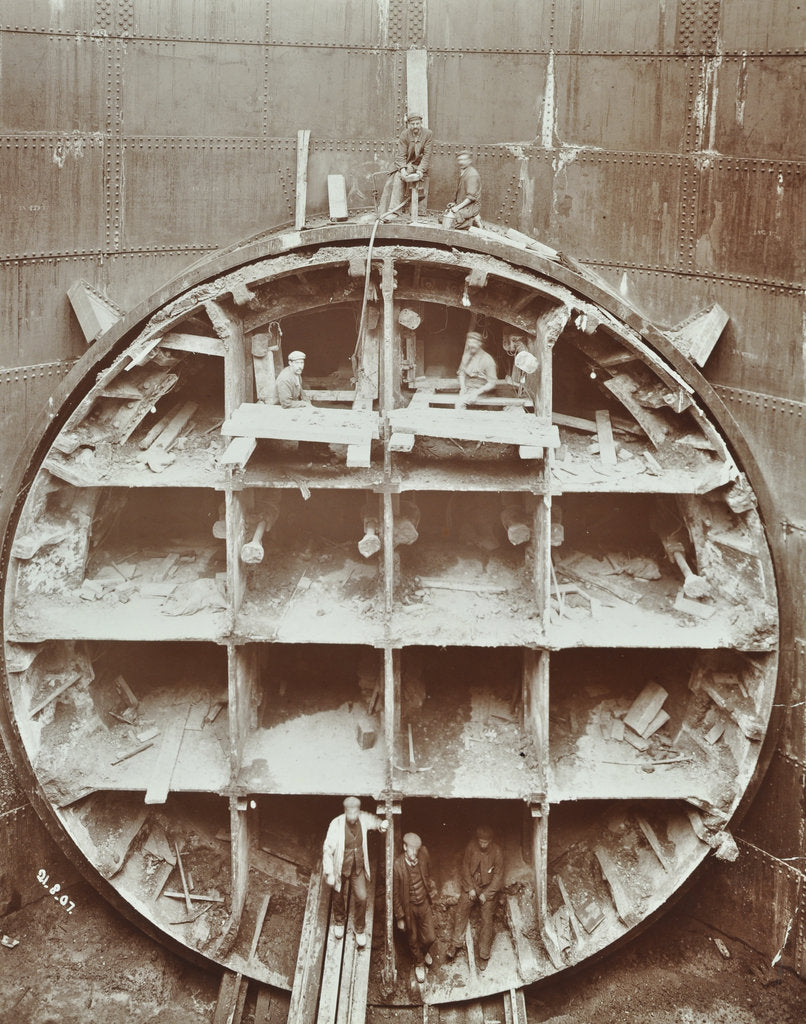 Detail of Men standing in the cutting shield, Rotherhithe Tunnel, Stepney, London, August 1907 by Unknown