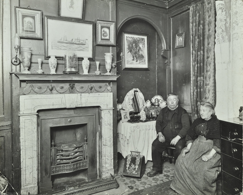 Detail of Elderly couple in Victorian interior, Albury Street, Deptford, London, 1911 by Unknown