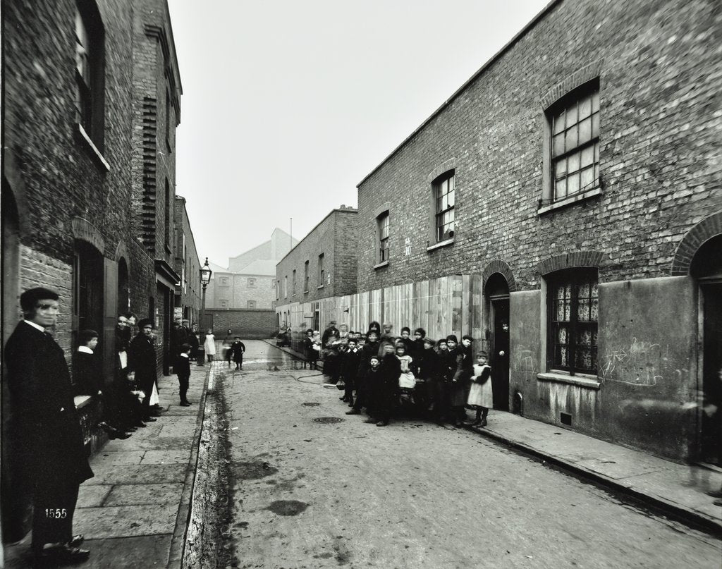 Detail of People outside boarded-up houses in Ainstey Street, Bermondsey, London, 1903 by Unknown