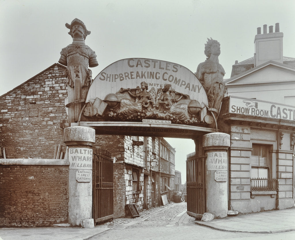 Detail of Ships' figureheads over the gate at Castle's Shipbreaking Yard, Westminster, London, 1909 by Unknown