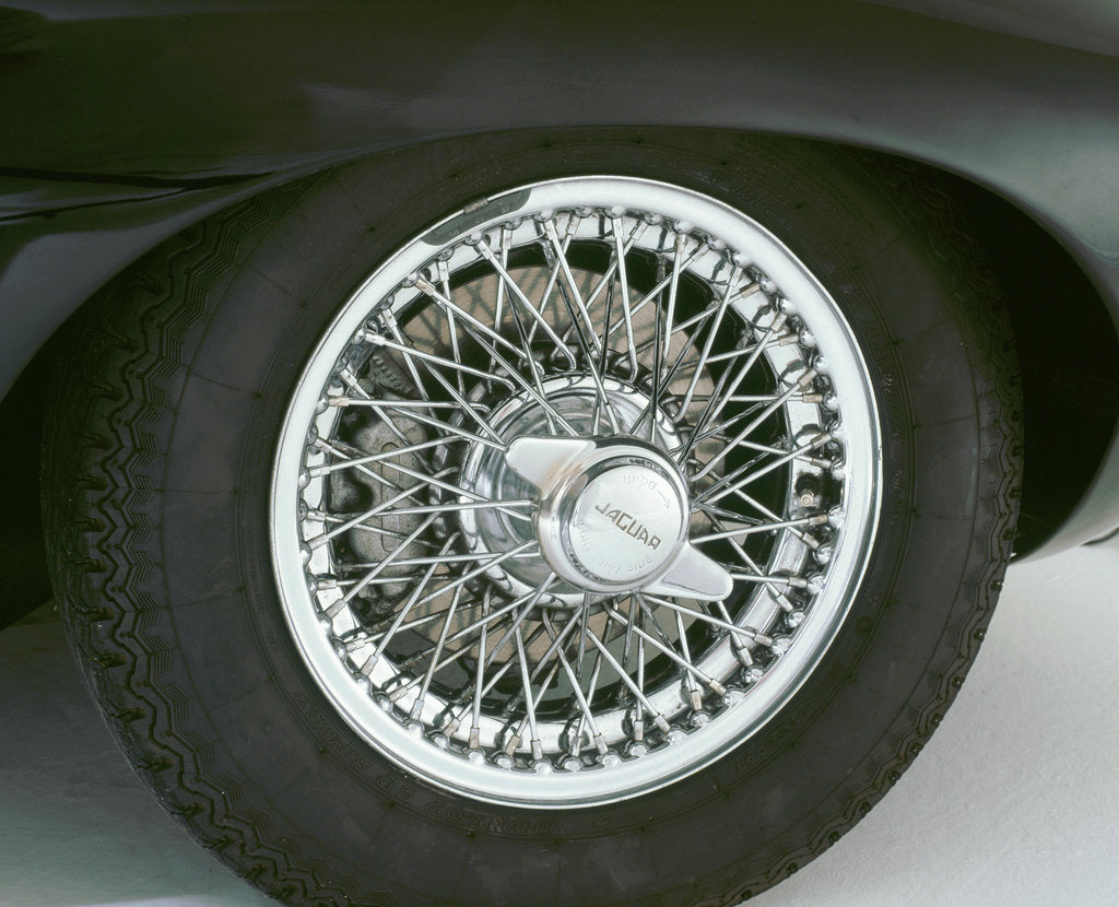 Detail of 1964 Jaguar  E type 3.8 chrome wire wheel by Unknown