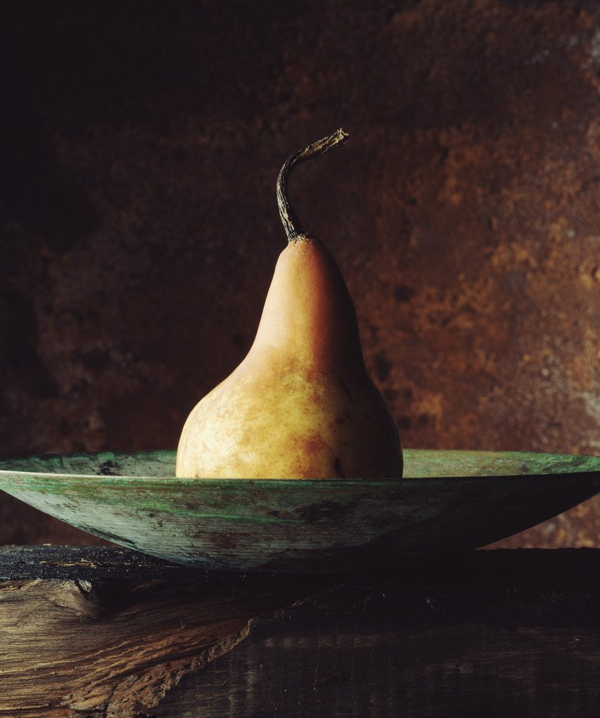 Detail of Single Pear in Bowl by Corbis