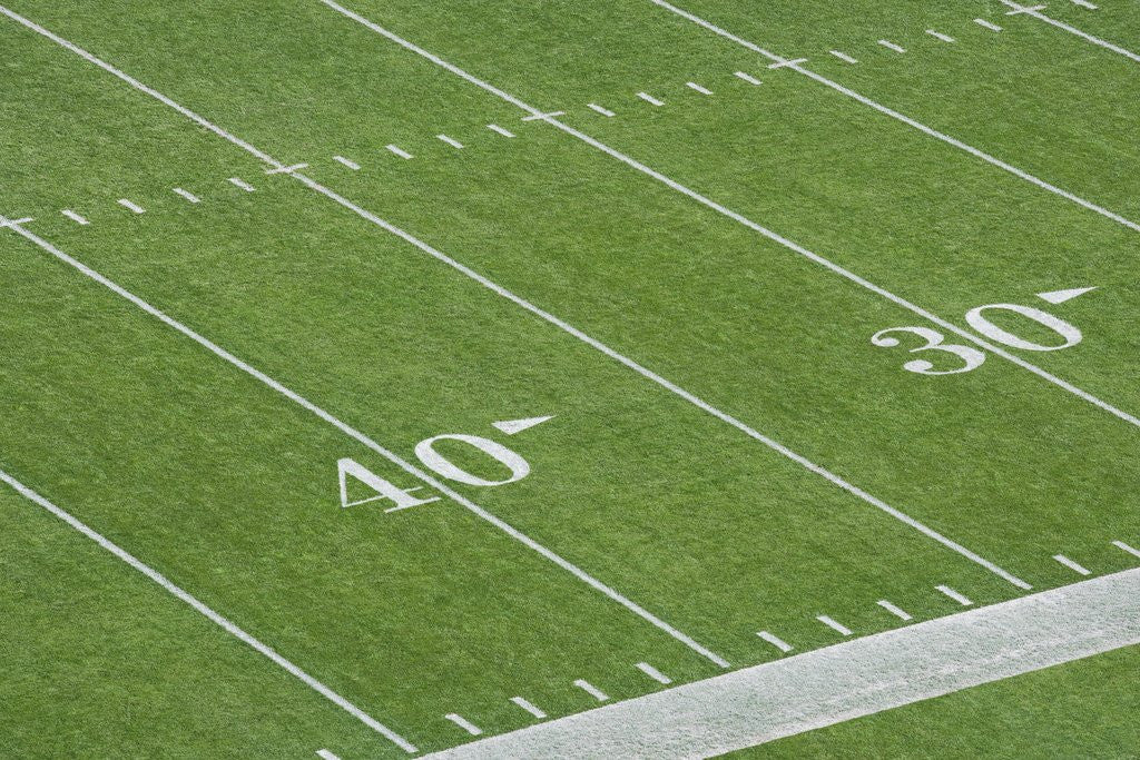 Detail of Yard Lines on Football Field by Corbis