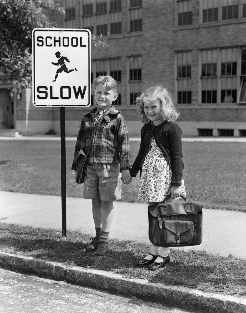 Detail of 1930s 1940s Boy Girl Holding Hands Next To School Slow Sign by Corbis