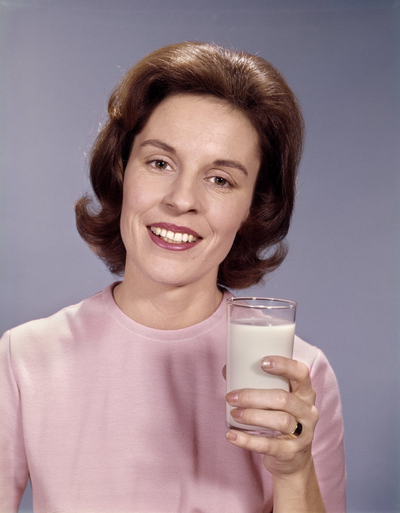 Detail of 1960s Woman Milk by Corbis