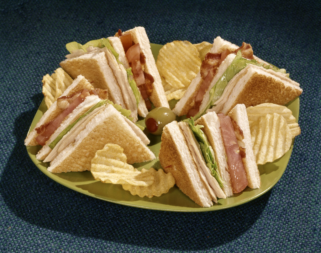 Detail of 1960s Toasted Club Sandwich Turkey Bacon Lettuce Tomato Green Plate by Corbis