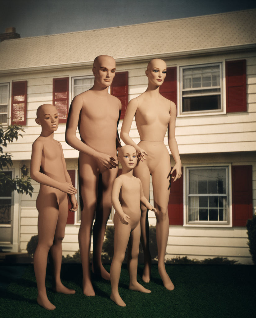 Detail of 1970s Mannequin Family Mother Father Two Children In Front Of Suburban House Outdoor by Corbis