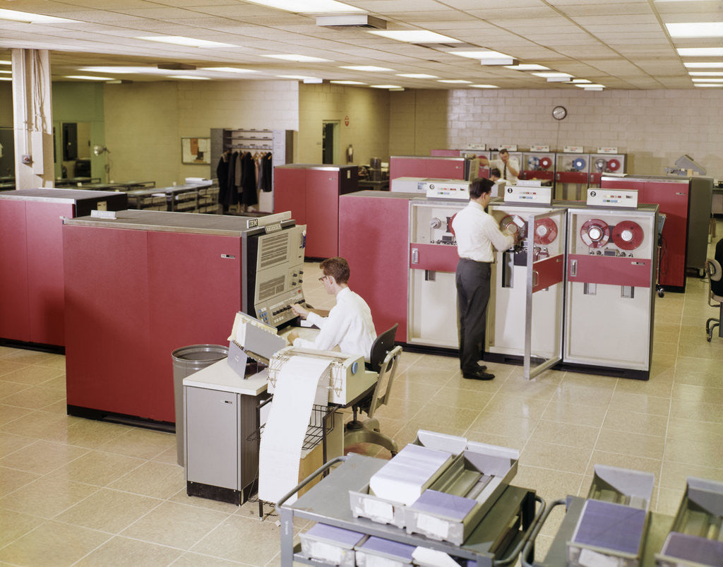 Detail of 1960s Two Men Computer Programmers In Ibm 3680 Mainframe Computer Room by Corbis