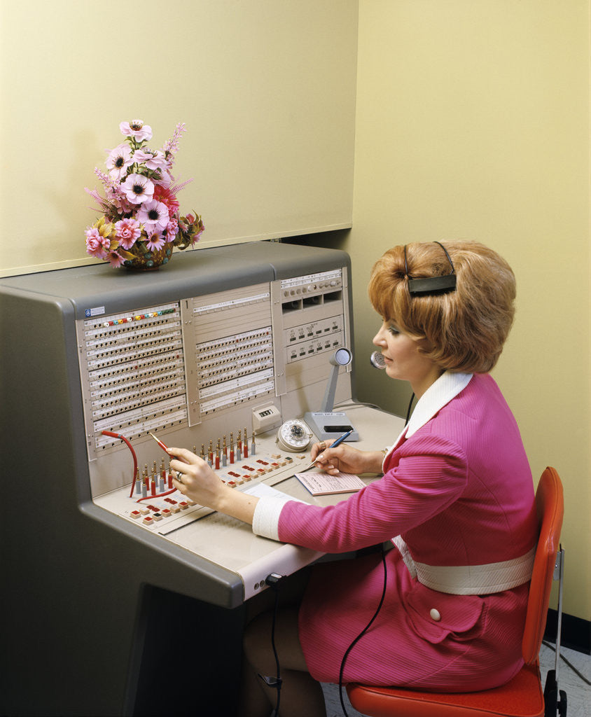 Detail of 1960s 1970s Office Woman Operator Working At Pbx Telephone Switchboard by Corbis