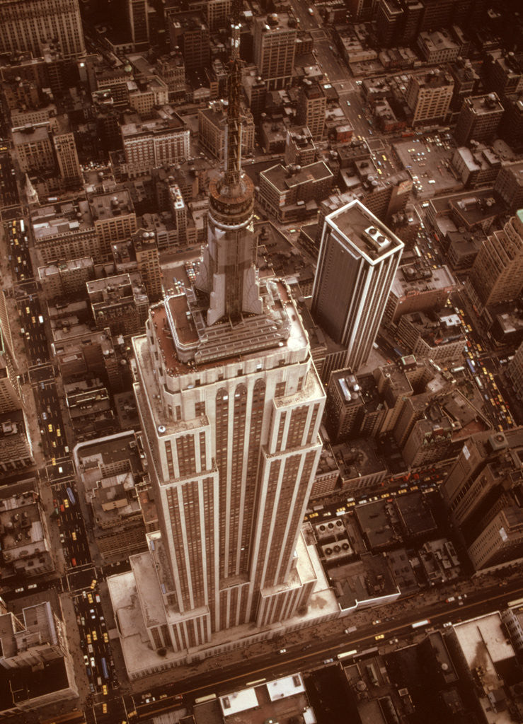 Detail of 1970s Aerial Shot From Helicopter Looking Down Full Length Of Empire State Building by Corbis