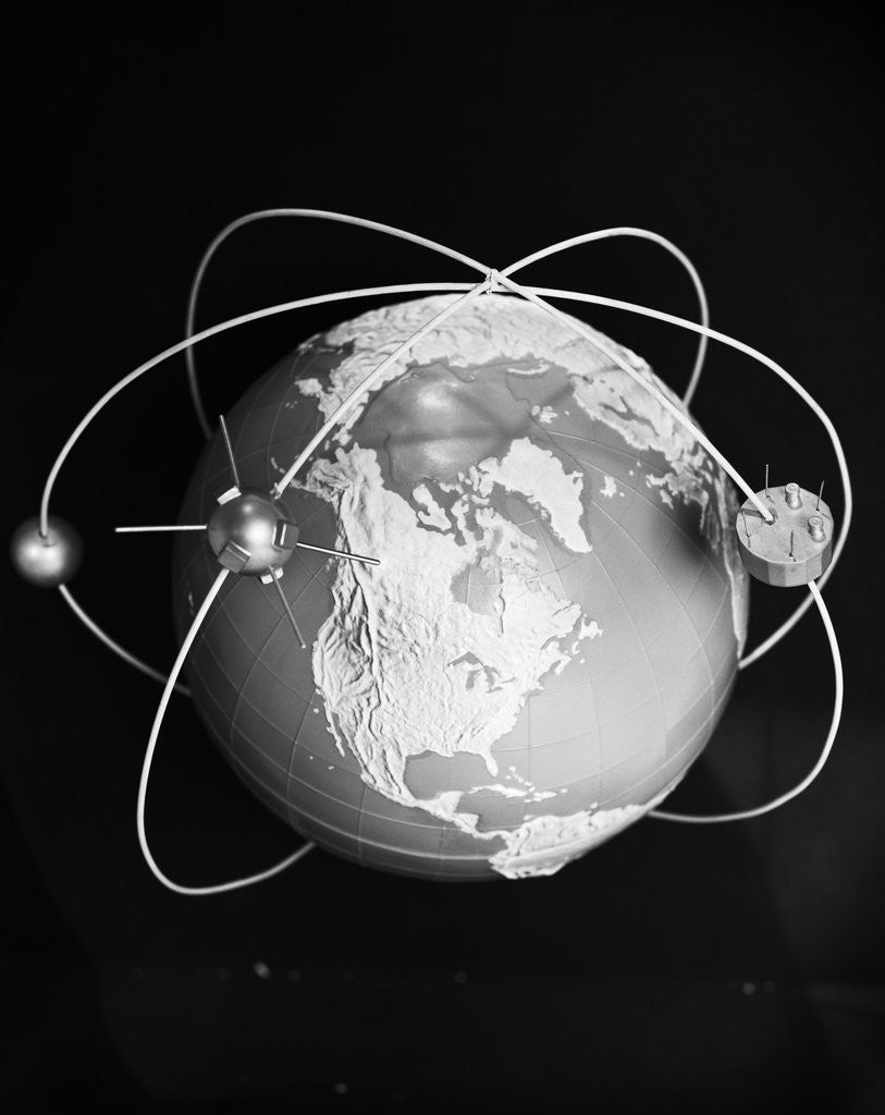 Detail of 1960s Model Of Earth With Three Satellites In Orbit by Corbis