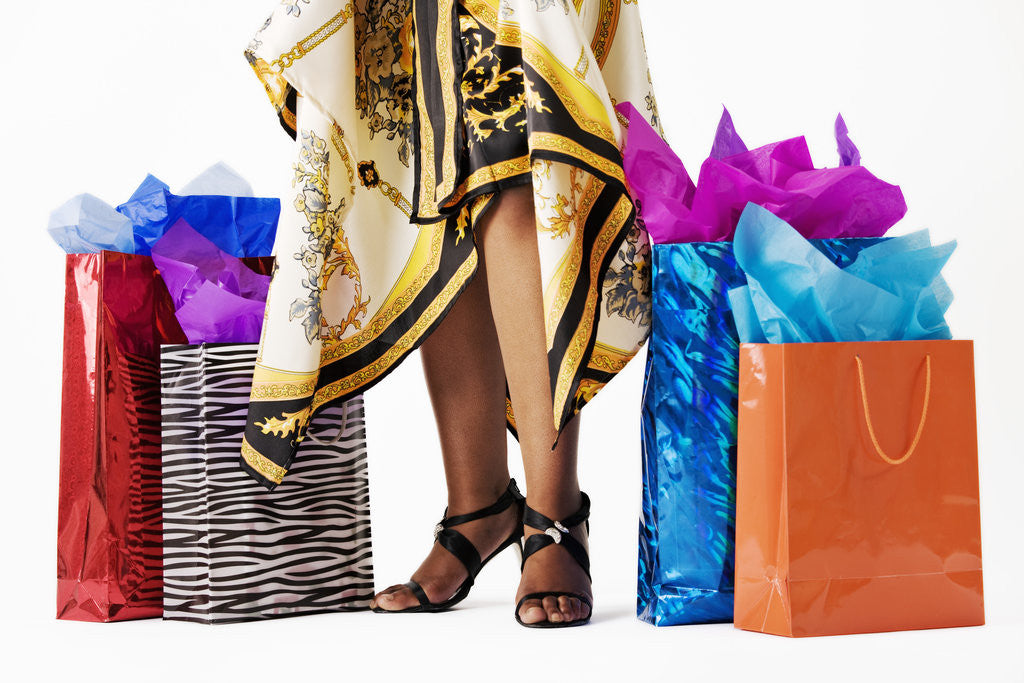 Detail of Woman with Gift Bags by Corbis