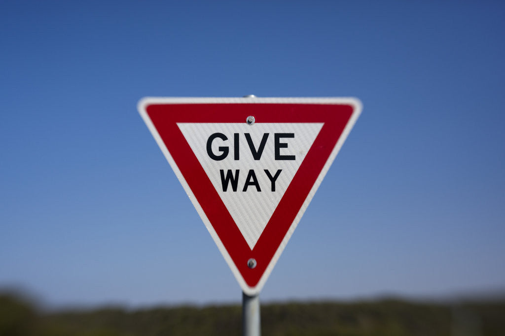 Detail of Give Way road sign on Great Ocean Road in Australia by Corbis