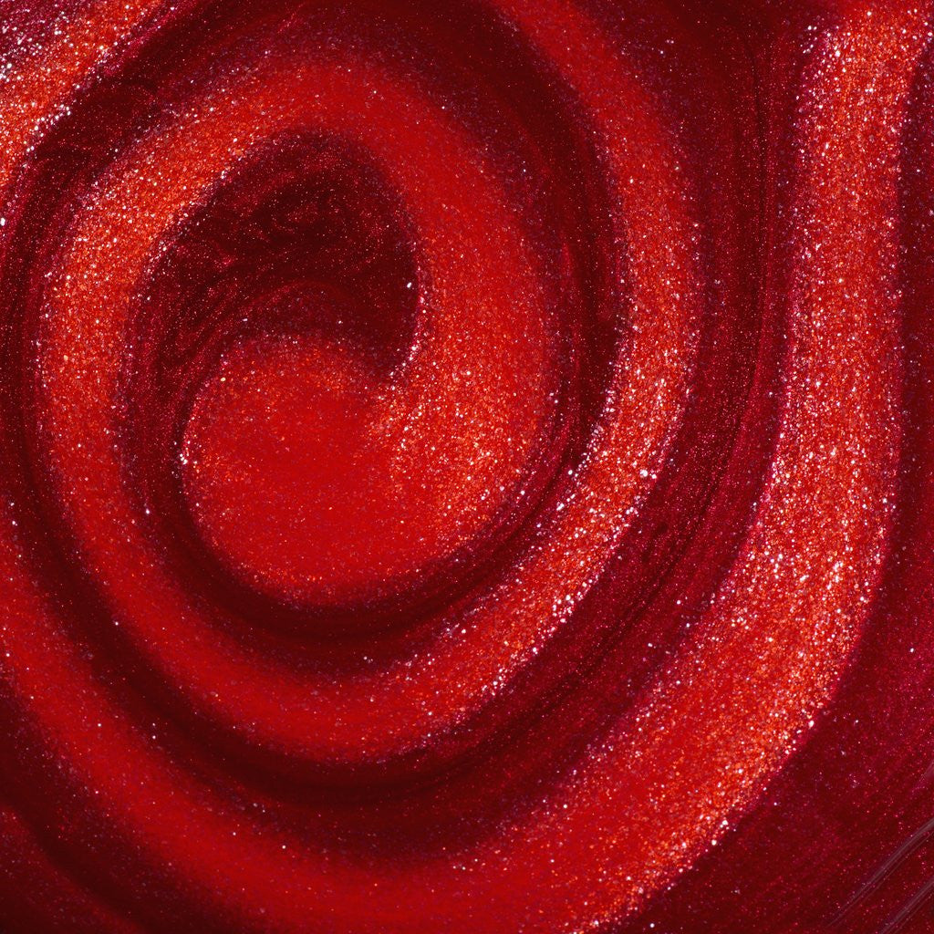 Detail of Swirls of nail polish by Corbis