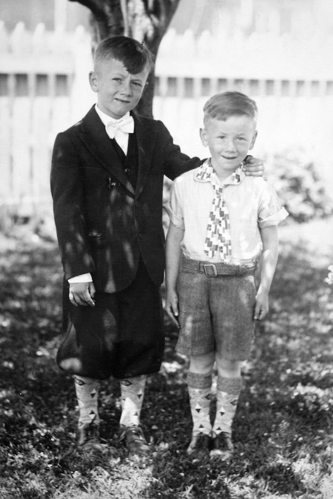 Detail of Two brothers pose in the backyard, ca. 1930 by Corbis