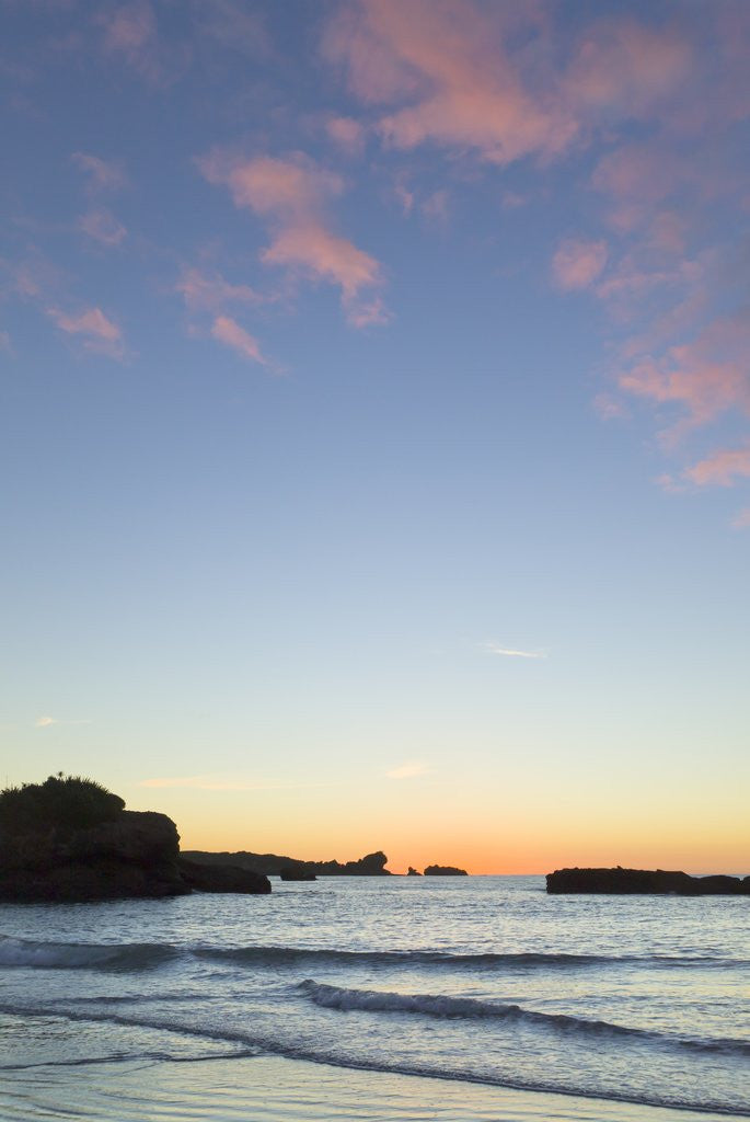 Detail of Sunset on beach, South Island, New Zealand by Corbis