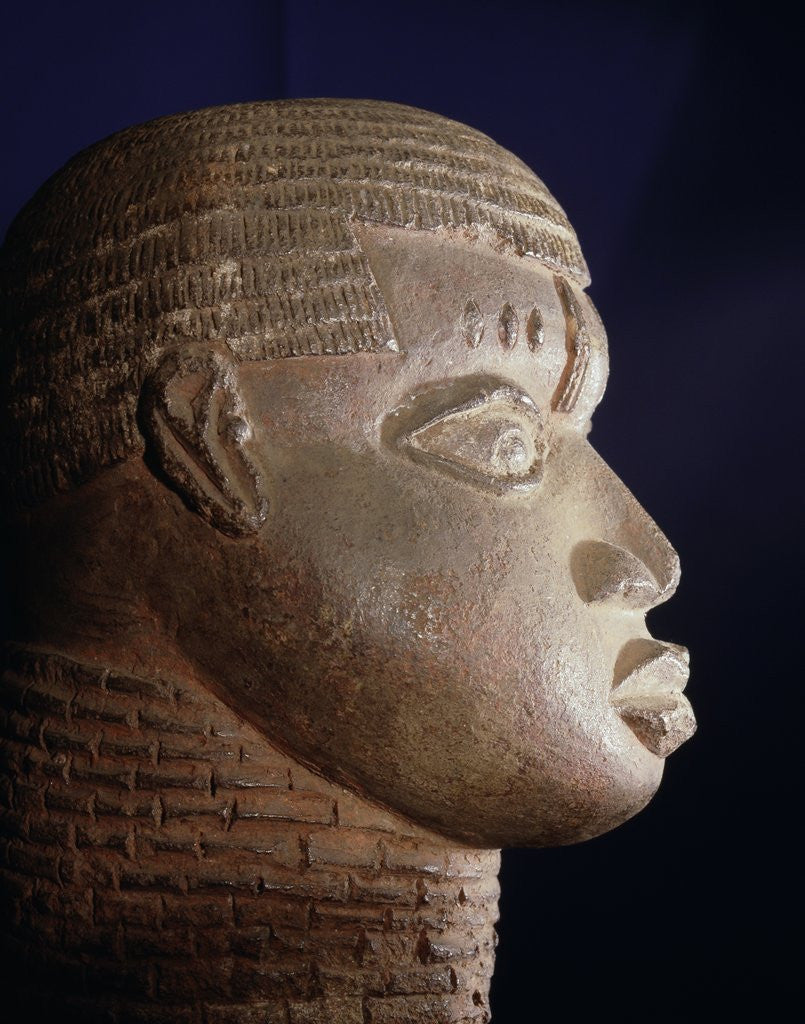 Detail of Benin terracotta head of a man by Corbis