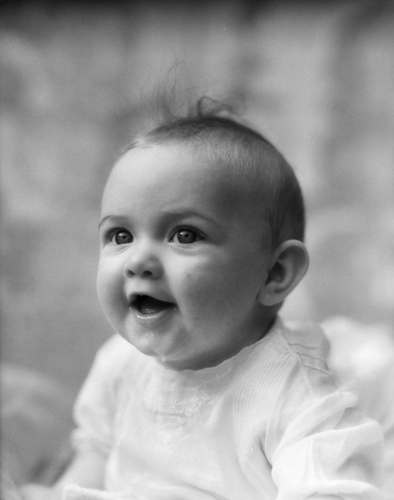 Detail of 1930s profile portrait five month old happy smiling baby by Corbis