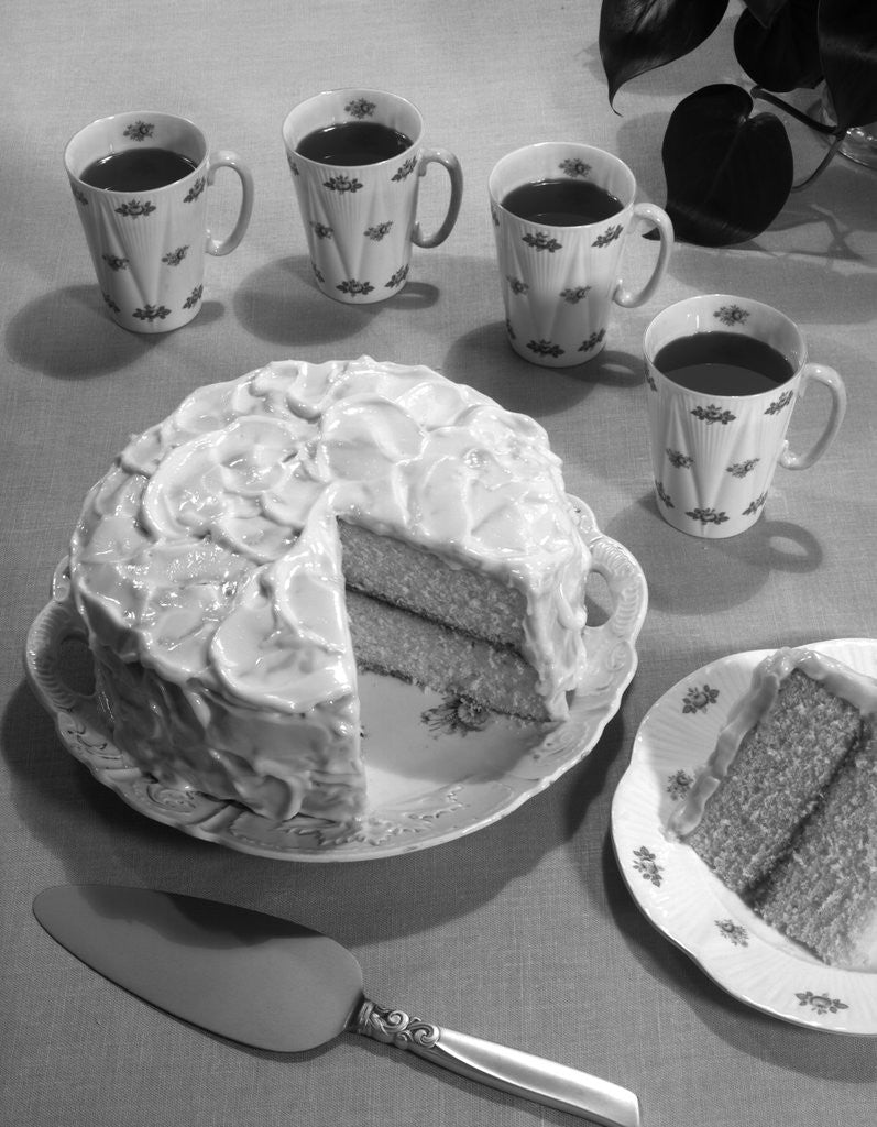 Detail of 1950s dessert vanilla layer cake and coffee by Corbis