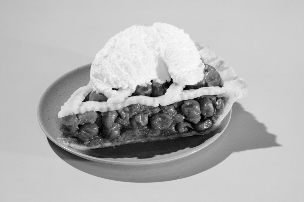 Detail of 1950s slice of cherry pie alamode dessert by Corbis