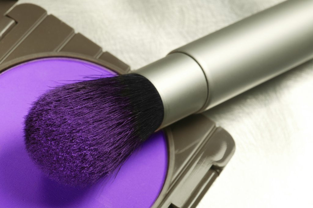 Detail of Make Up Brush With Bright Purple Blush Powder by Corbis