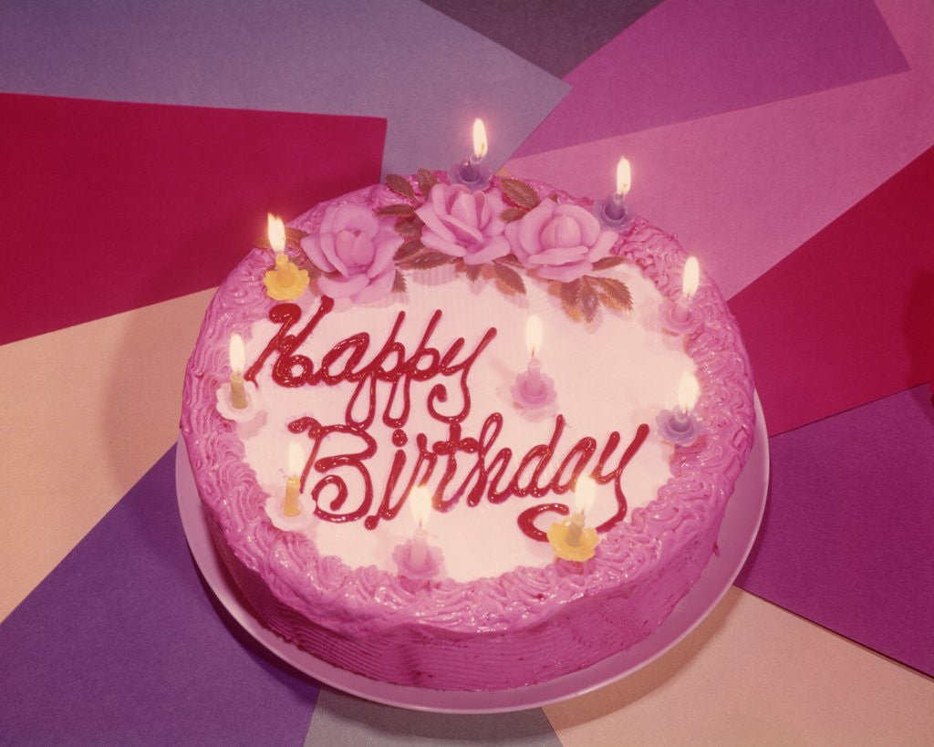 Detail of 1960s Birthday Cake With Ten Candles Lit by Corbis