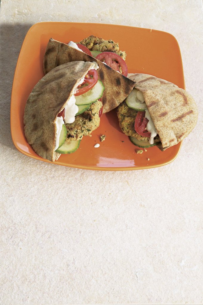 Detail of Chickpea burgers in pita bread by Corbis