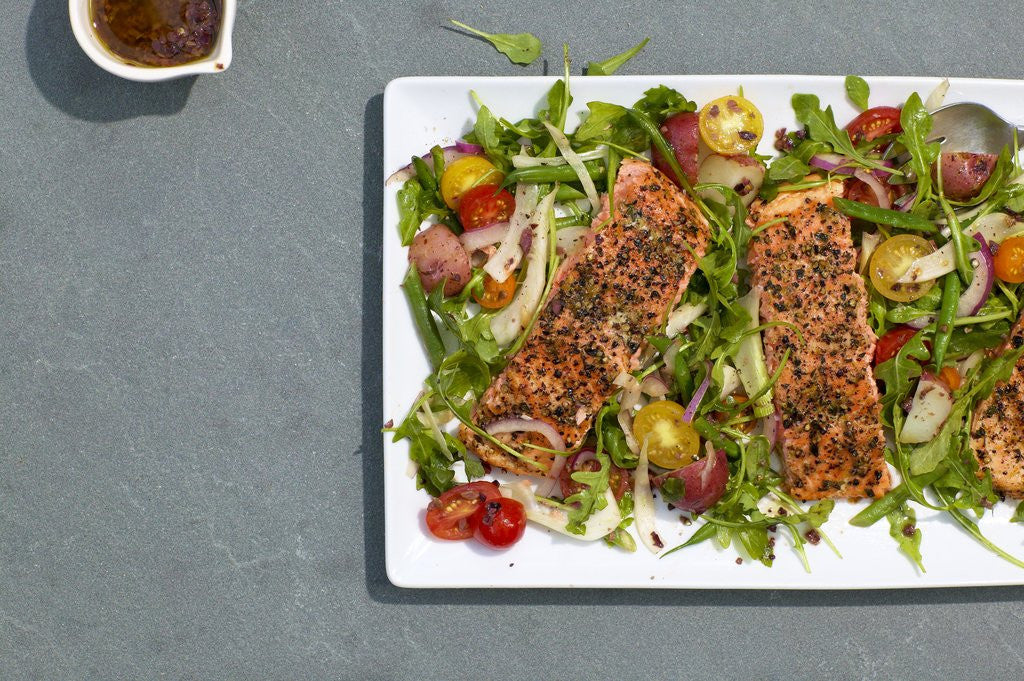 Detail of Salmon nicoise salad by Corbis