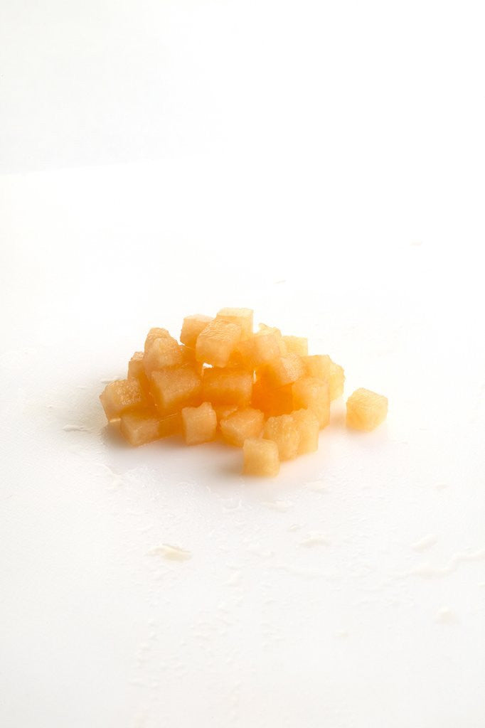 Detail of Small diced cantalope by Corbis