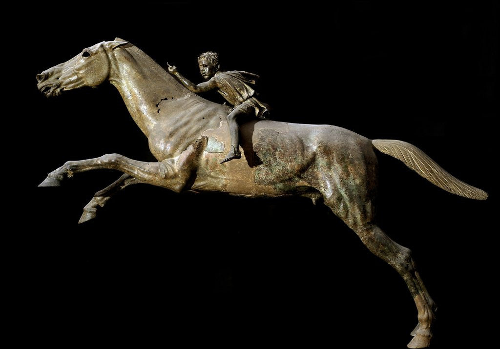 Detail of Ancient Greek sculpture of a rider on a horse jumping an obstacle by Corbis