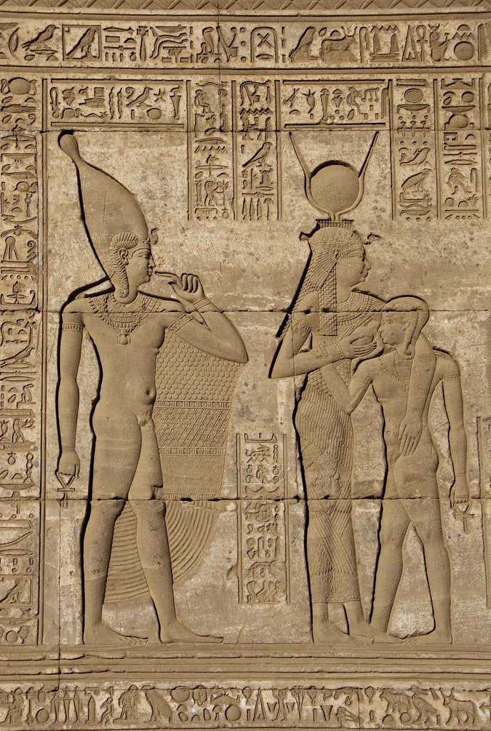 Detail of Ancient Egyptian sunken relief depicting goddess Isis-Hathor suckling her son Ihy by Corbis